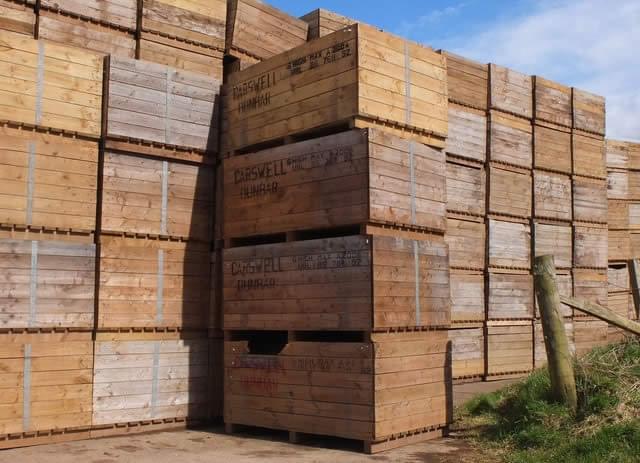 A big stack of boxes or crates sat on top of one another